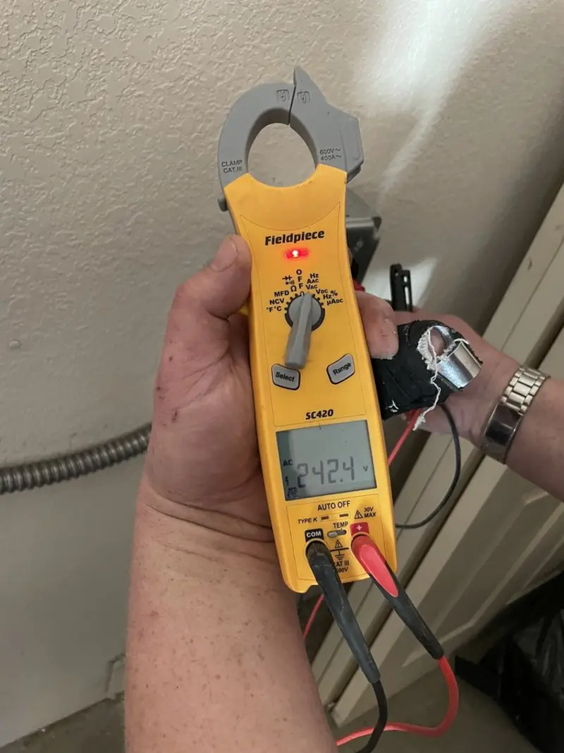 Voltage testing with clamp meter during Generator Installation in Winchester